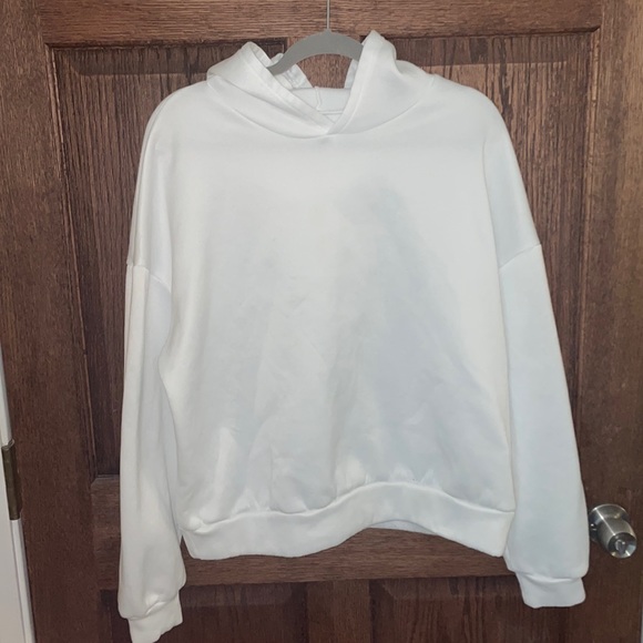 White unisex hoodie with a logo on the back. Size Medium - Picture 2 of 4